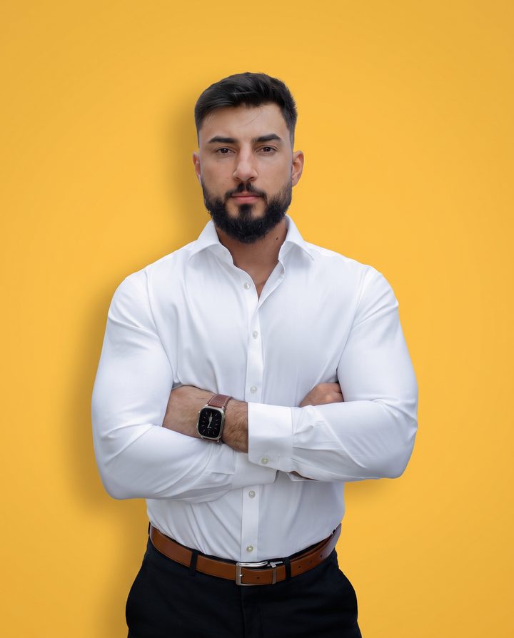 Eduard Vlase, who made Unstuck, standing with his arms crossed